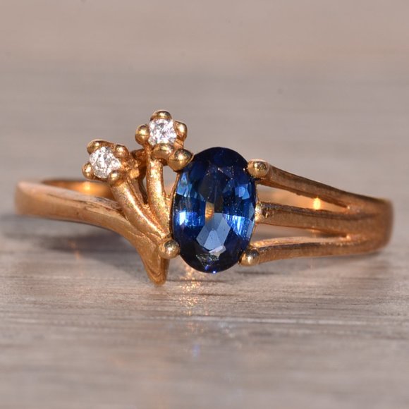 Oval Sapphire and Natural Diamond Ring in Yellow Gold